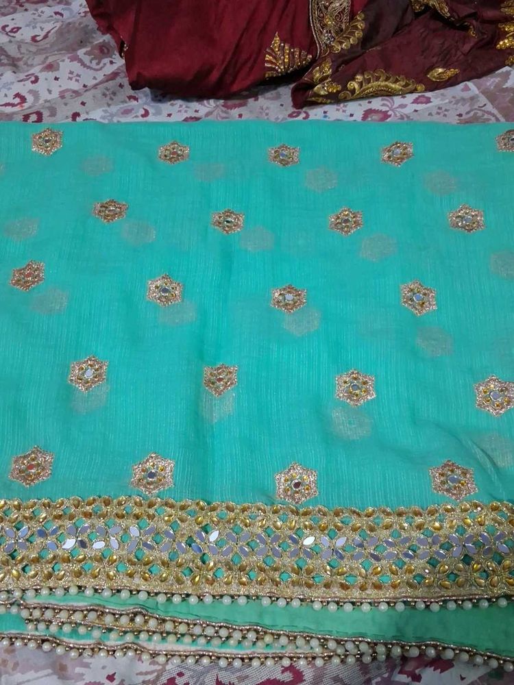 Stunning Teal Embellished Saree