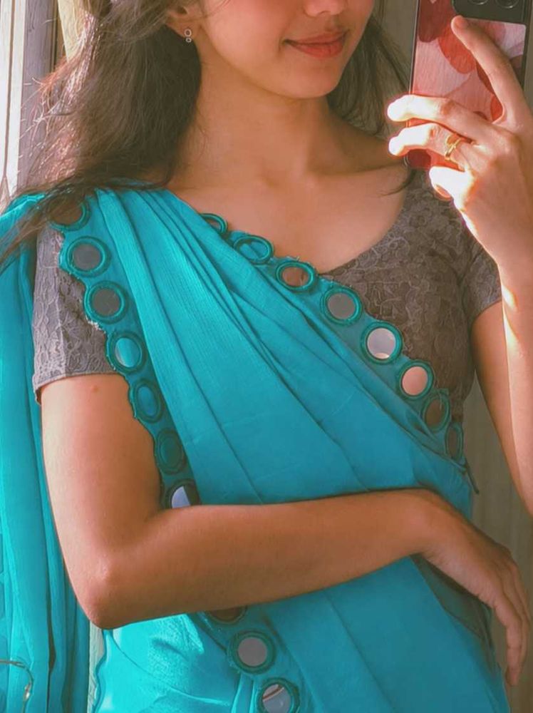 Elegant Teal Saree with Mirror Work Border