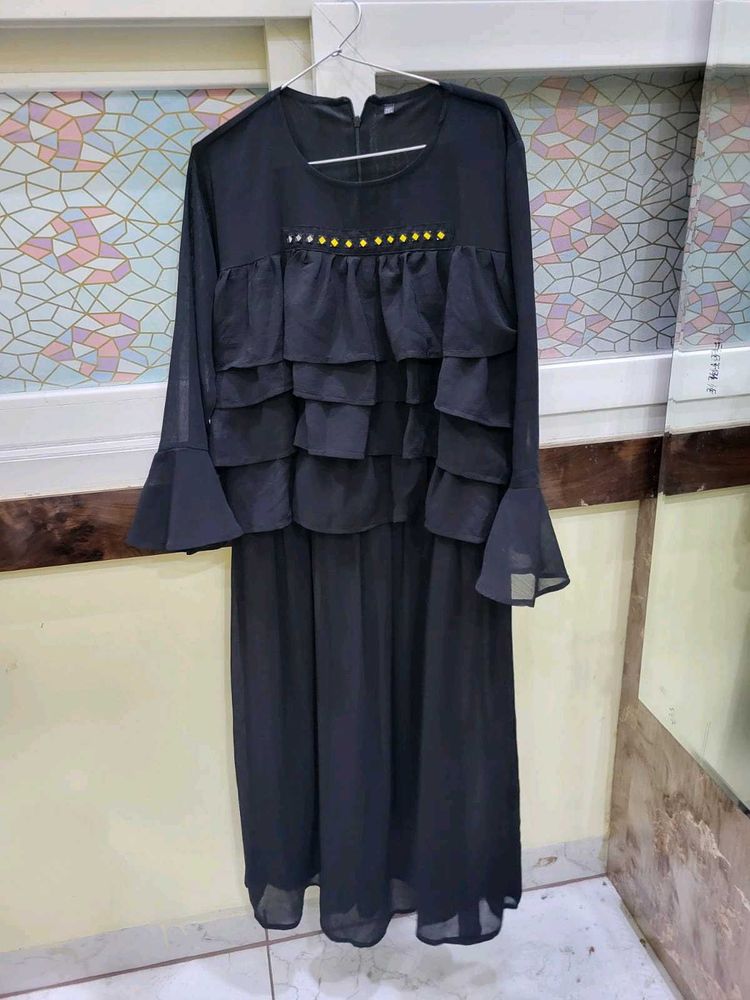 Elegant Black Ruffled Gown