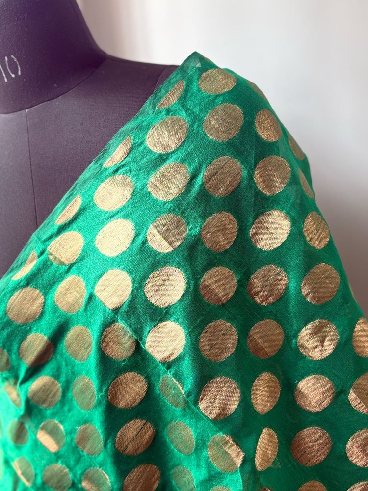 Green fabric with Gold Polka Dots