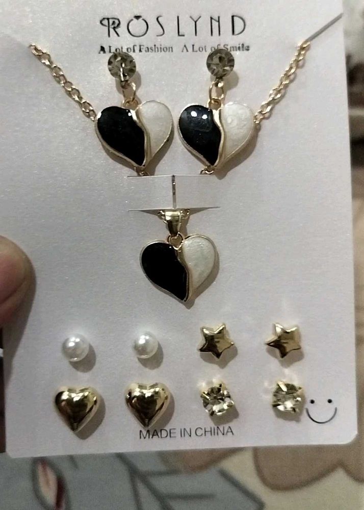 Pendant set with earrings+ 4 pair of studs