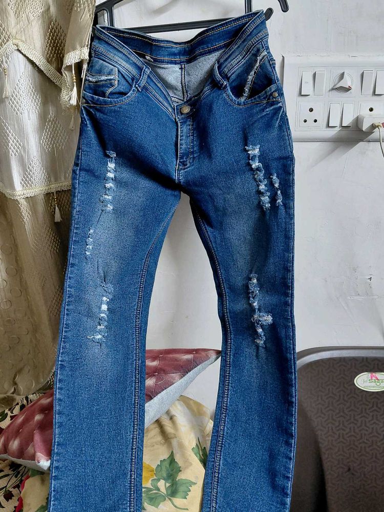 Distressed Blue Denim Jeans