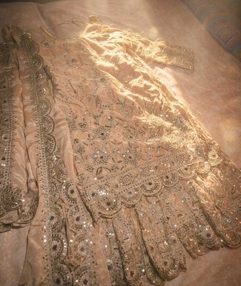 Very elegant mirror work Sharara Suit