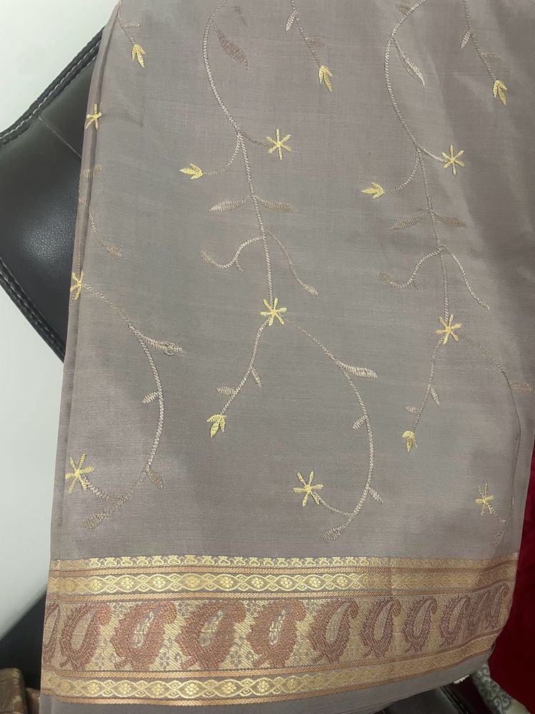 Fully embroidered greyish mauve colour silk saree