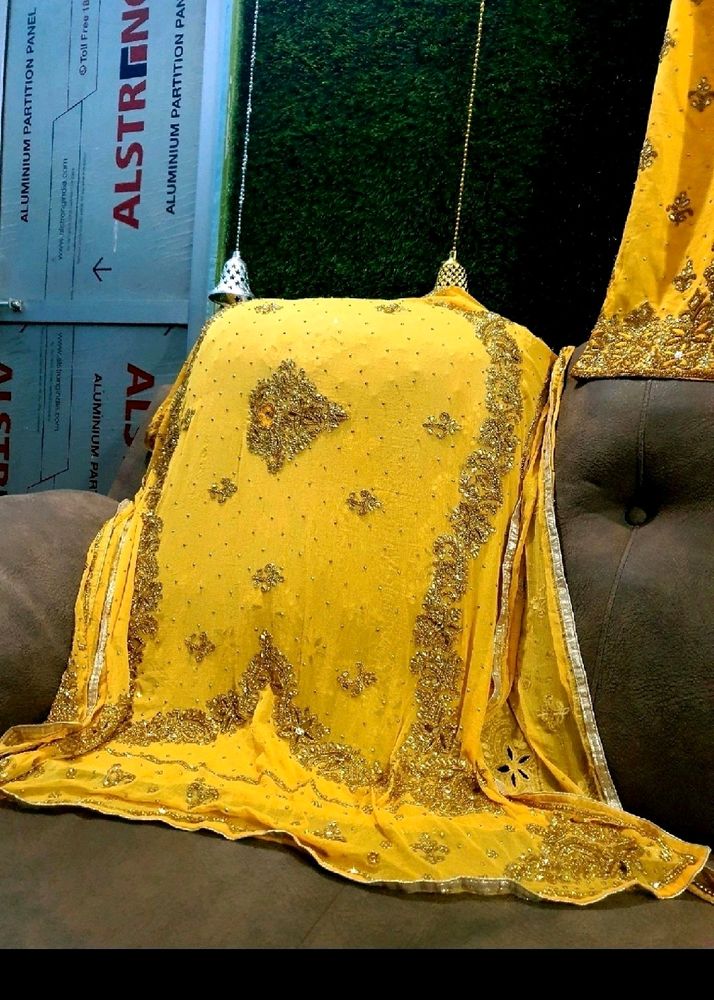 Beautiful very heavy yellow suit