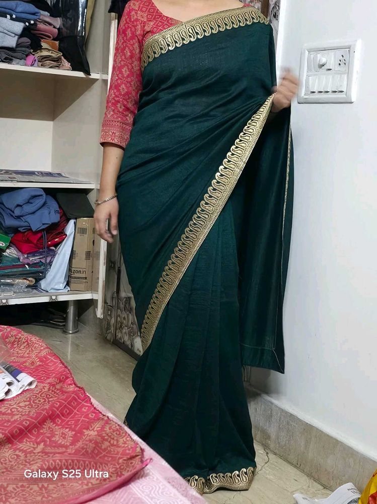 Elegant Green Saree with Gold Border