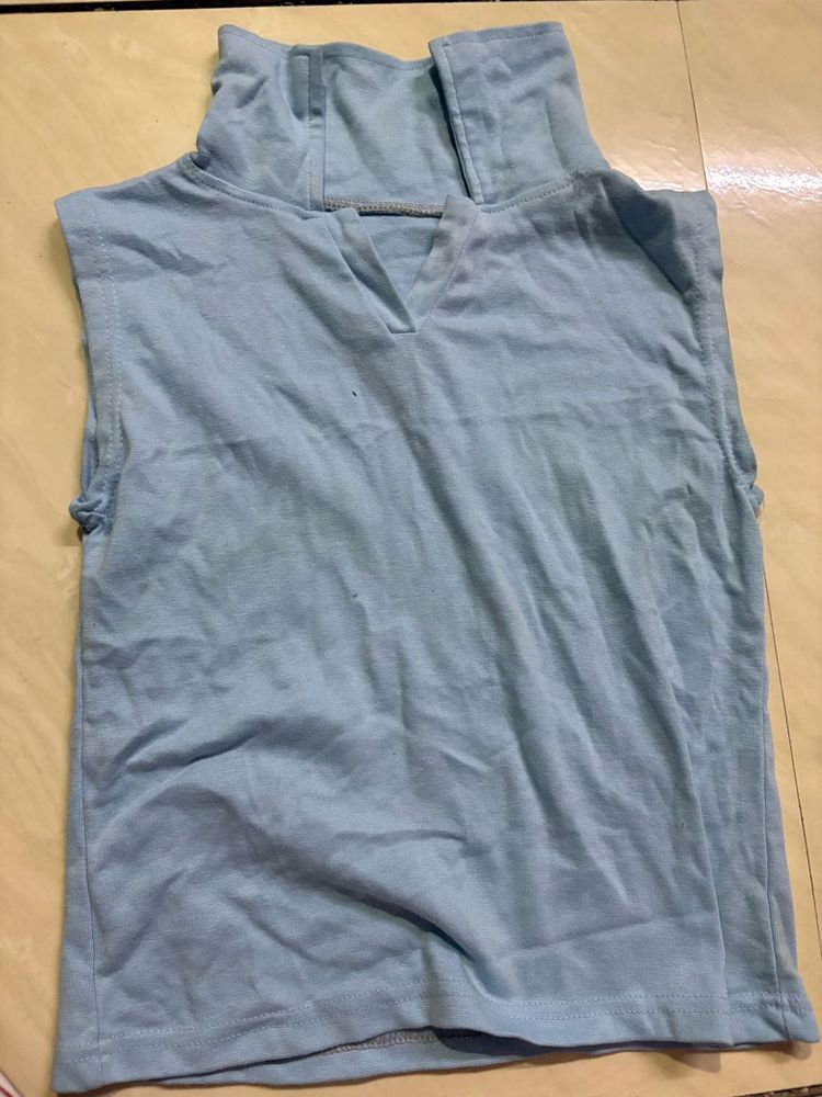 Blue Sleeveless Turtleneck Top