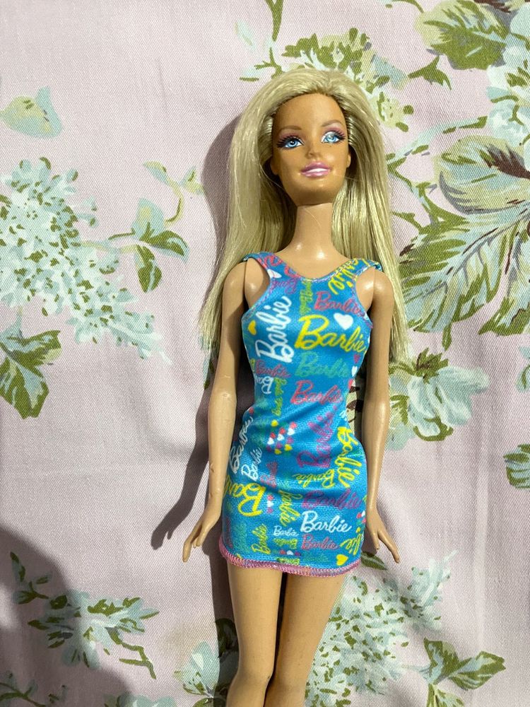rare face Barbie Doll