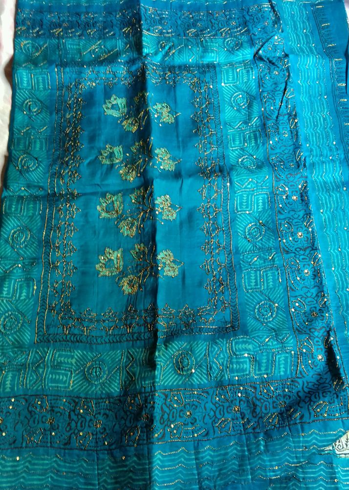 Stunning Teal Embroidered Silk Saree