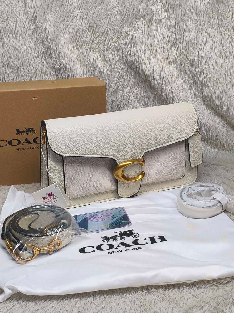 Coach Tabby Off White with c print.