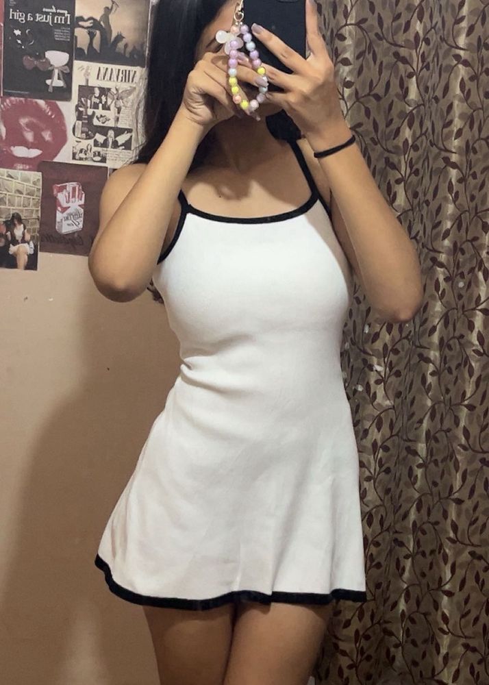 Cute White Mini Dress with Black Trim