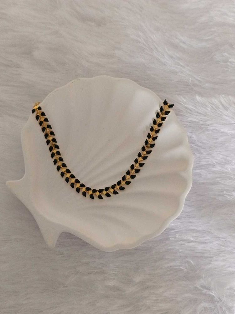 Gold and Black Herringbone Bracelet