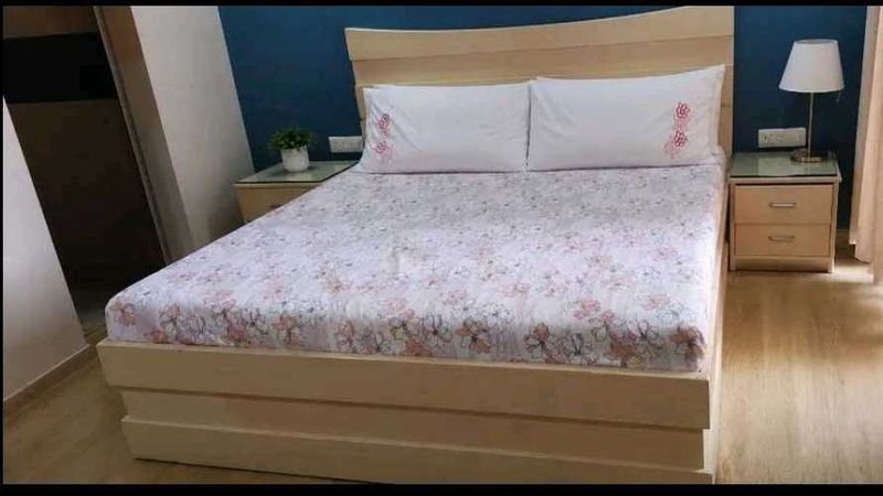 beige ivory bed with side tables for sale