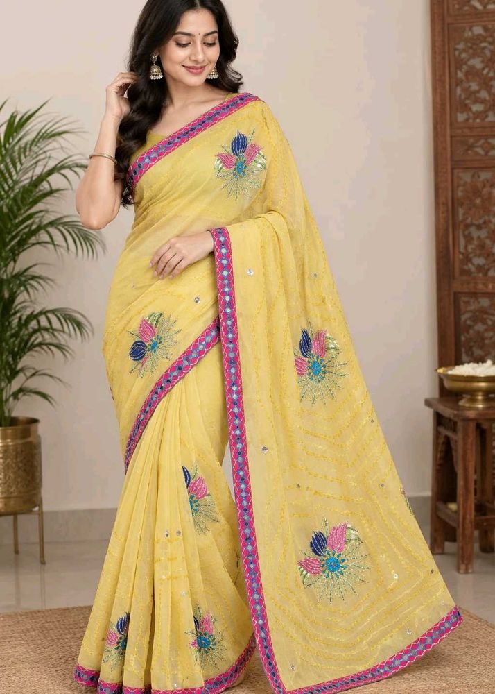 Elegant Yellow Embroidered Saree With Mirror work.