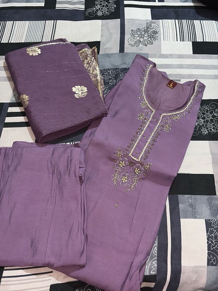 Elegant Purple Embroidered Kurta Set
