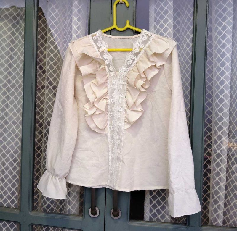 Victorian style ruffled blouse
