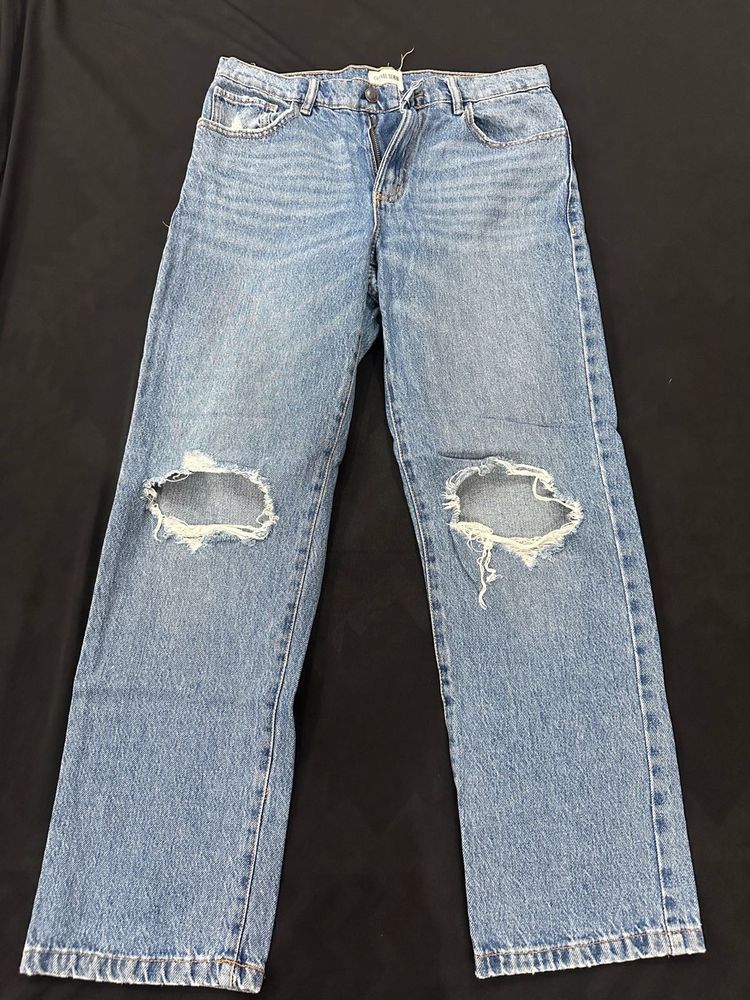 Distressed Blue Denim Jeans