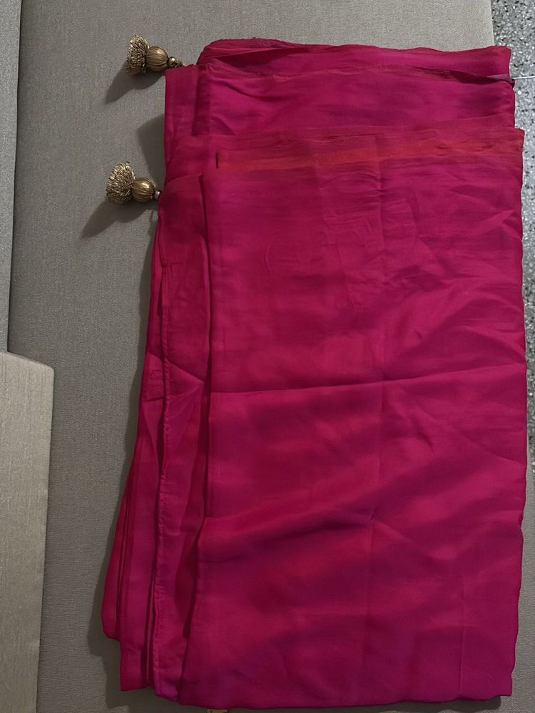 Vibrant Pink crepe Silk Saree with Tassels