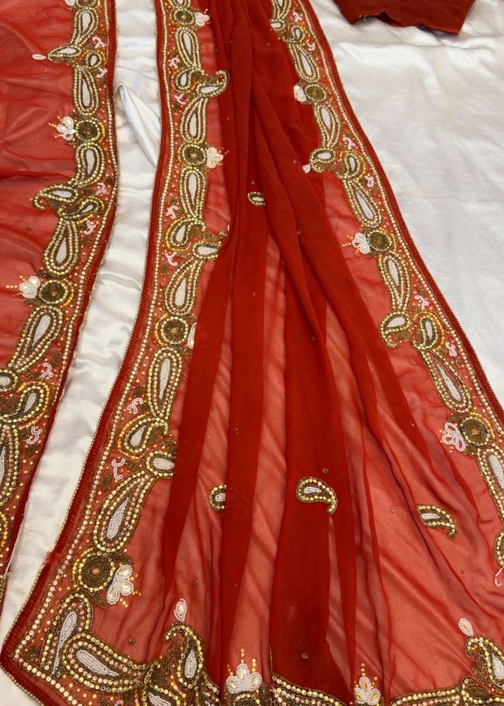 Red Embroidered Silk Saree with blouse