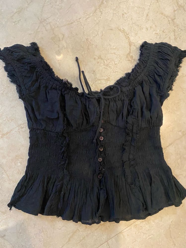 Black Smocked Peplum Top