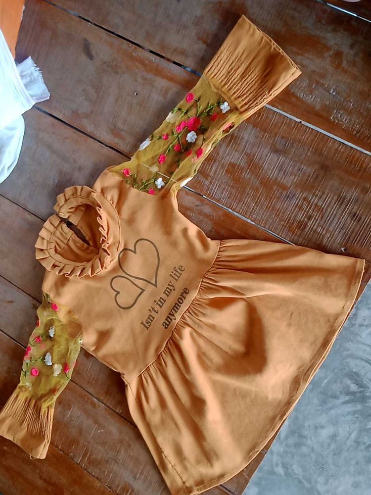 Mustard yellow girls frock top with floral net sle