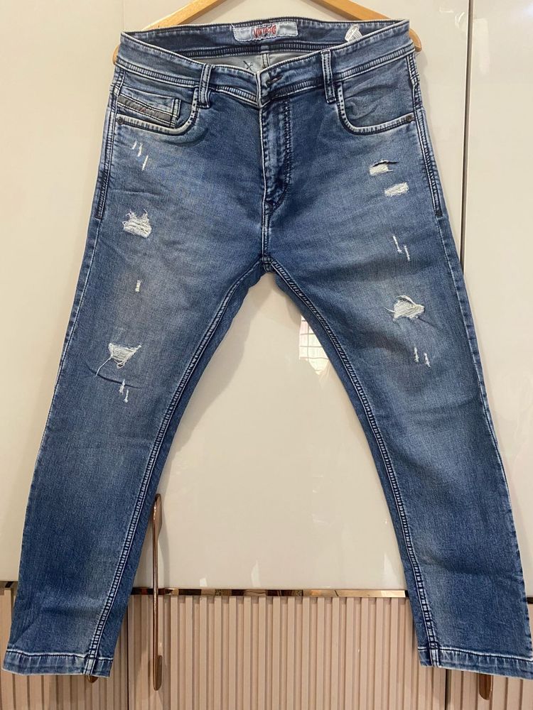 Distressed Denim Jeans