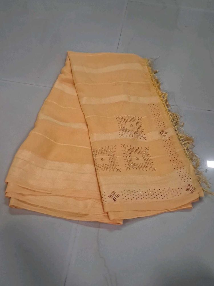Elegant Peach Saree with Embellishments