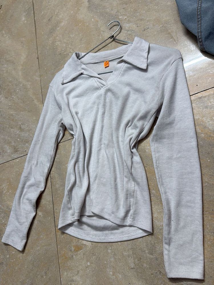 white collered full sleeve workout top
