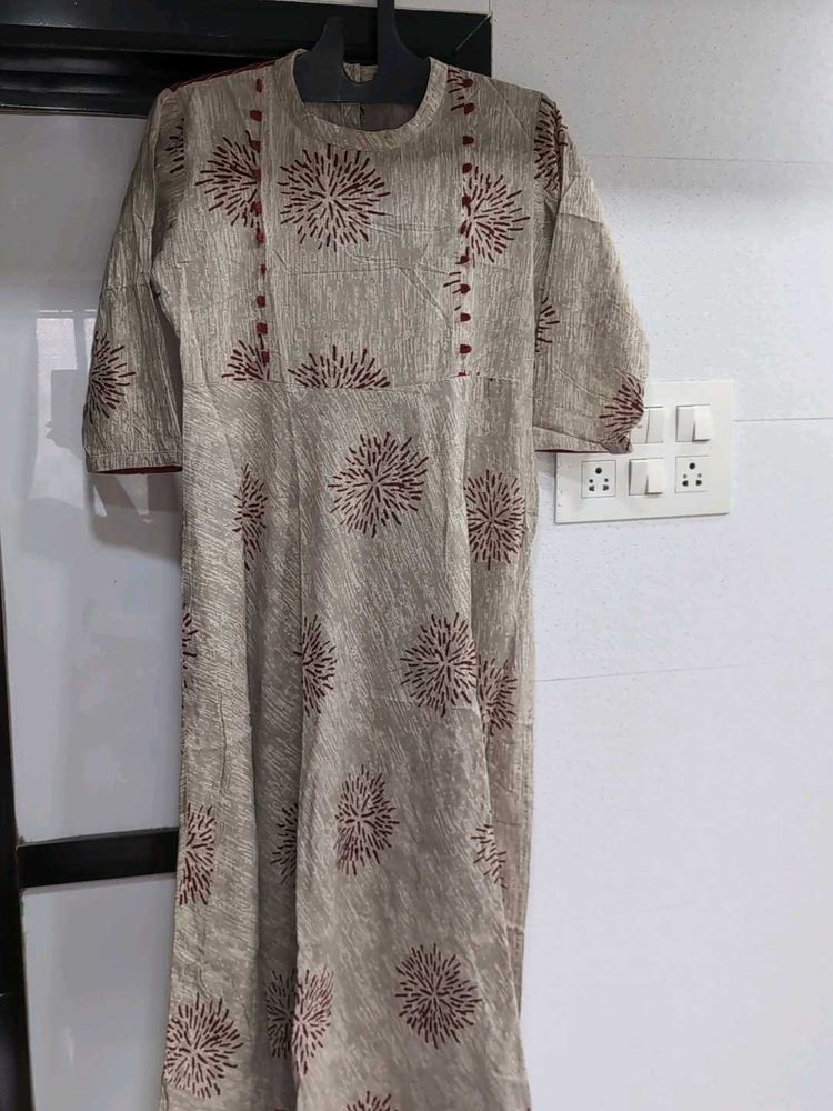 Elegant Beige Kurta with Starburst Print