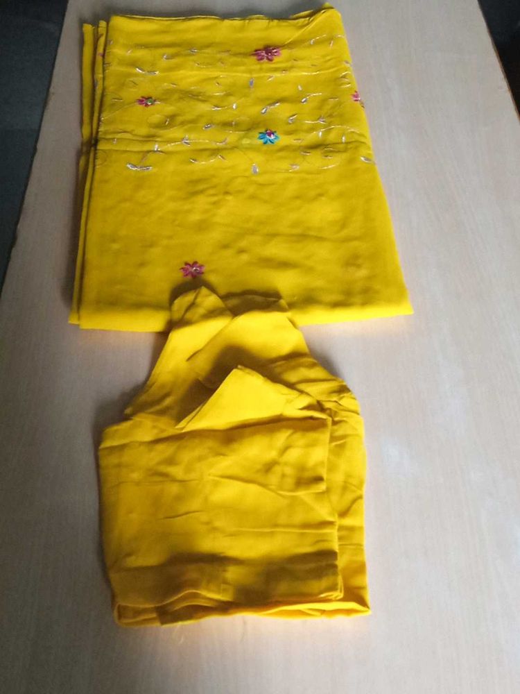 Vibrant Yellow saree with blowse  Embellishments