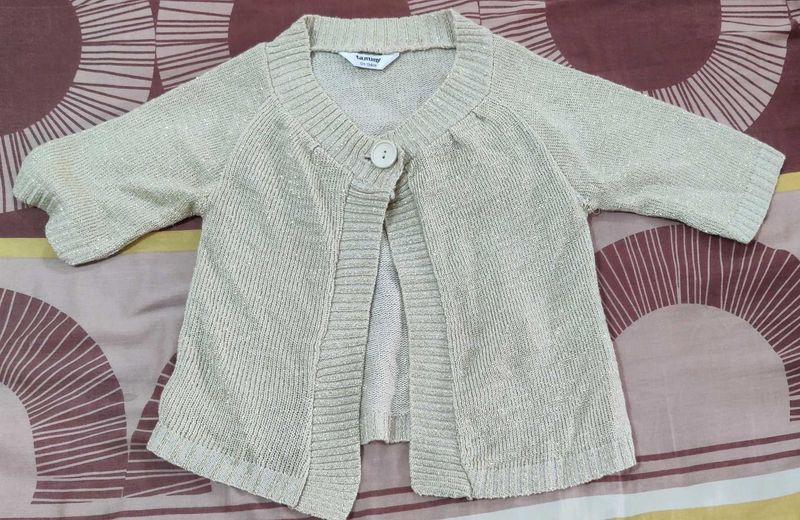 Cream with golden glitter shrug