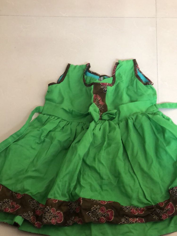 Stiched Cute Green Frock with Print Border