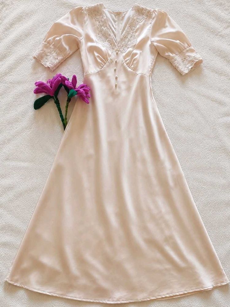 Elegant Peach Lace Trimmed Gown