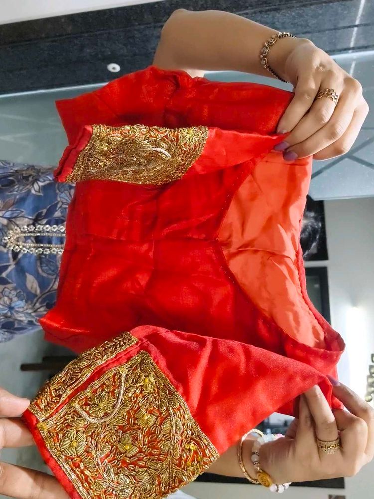 Red Embroidered Blouse and lehenga