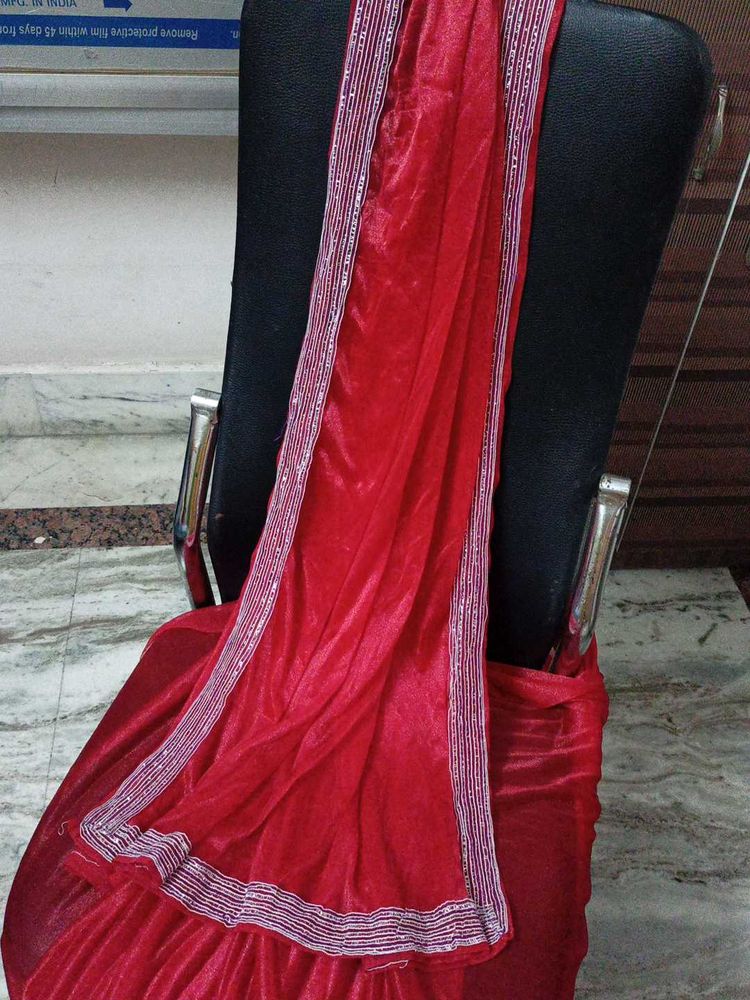 Vibrant Red Saree with Embellished Border
