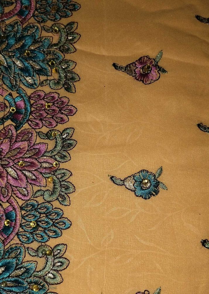 Embroidered dress material