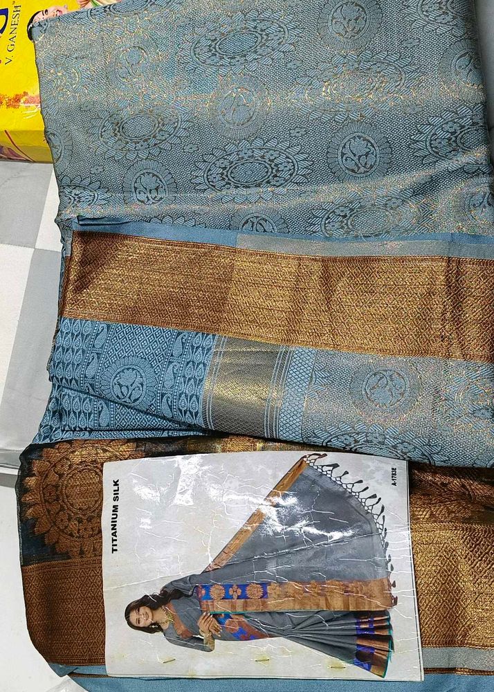 Elegant Grey Silk Saree with Gold Border