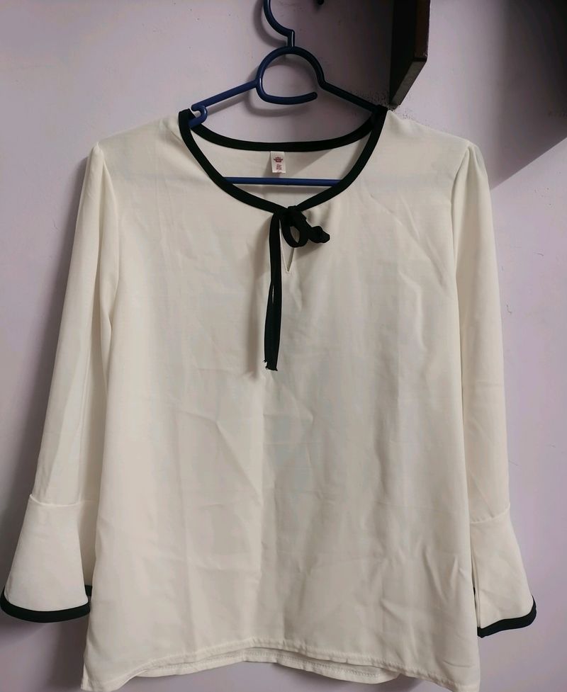 Elegant White Blouse with Black Trim