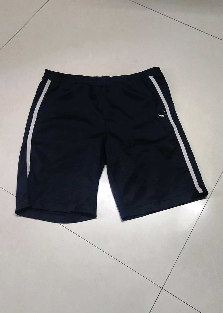 Reebok training shorts.