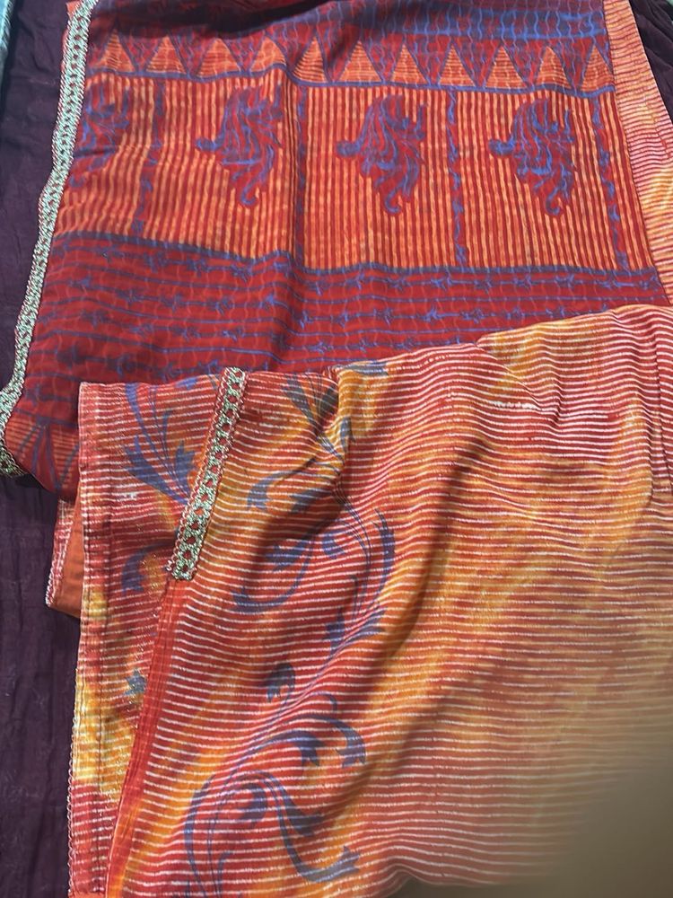 Vibrant Orange Saree with Elephant Print