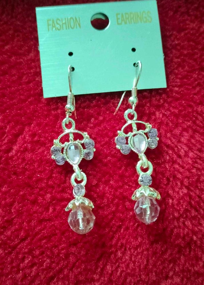 Brand new Elegant Drop Earrings with Purple Stones