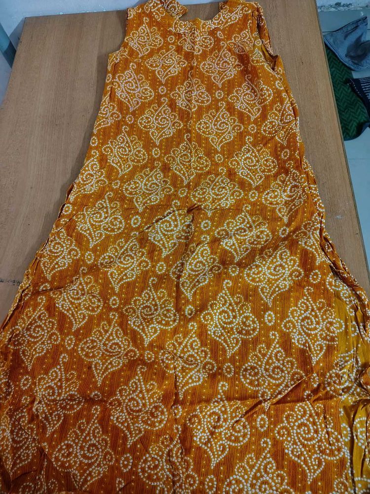 Mustard Yellow Printed Sleeveless Kurti