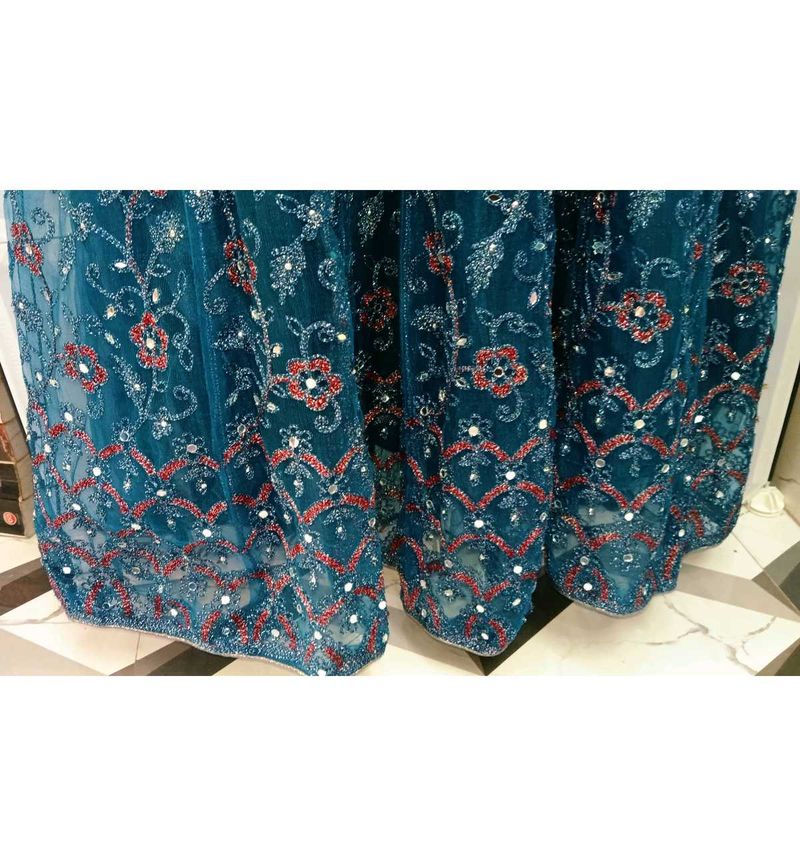 Elegant Teal Blue Party Wear Net Gown with Heavy S