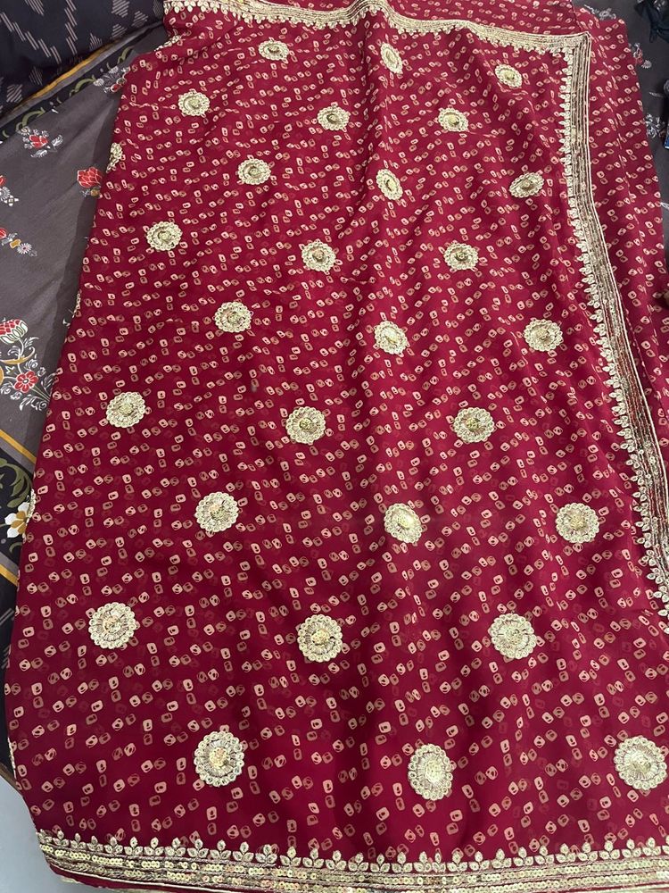 Elegant Maroon Saree with Gold Embroidery
