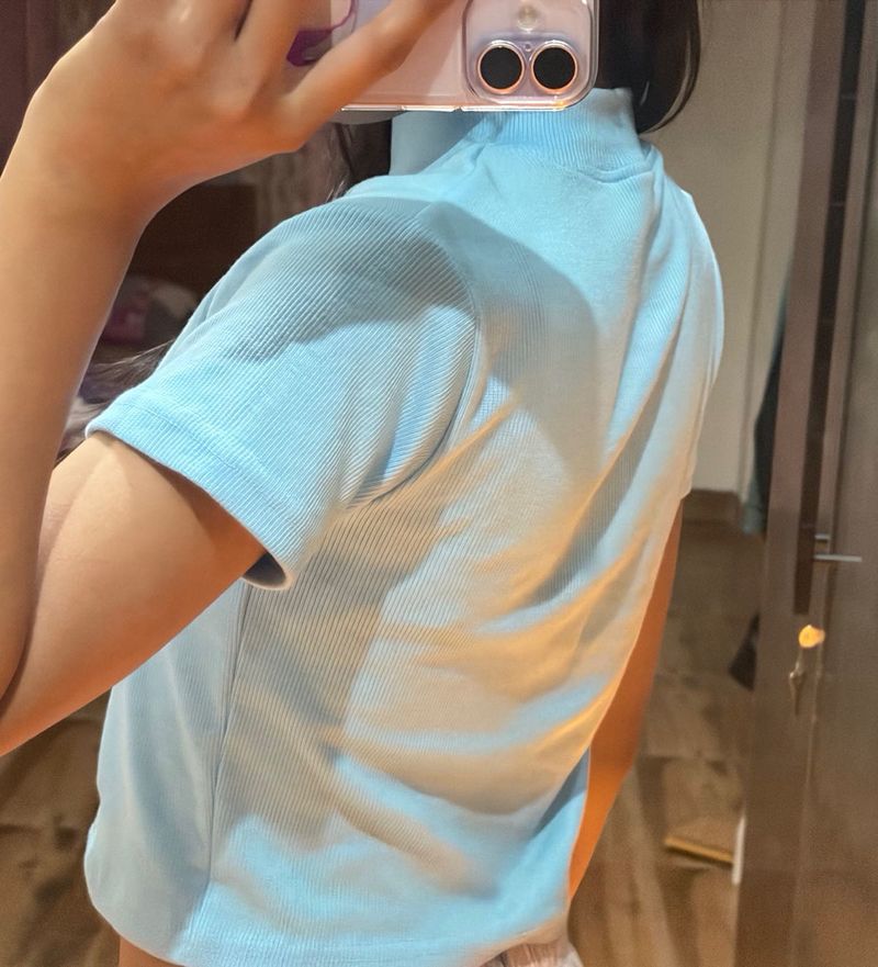 the pretty blue tops with butterfly