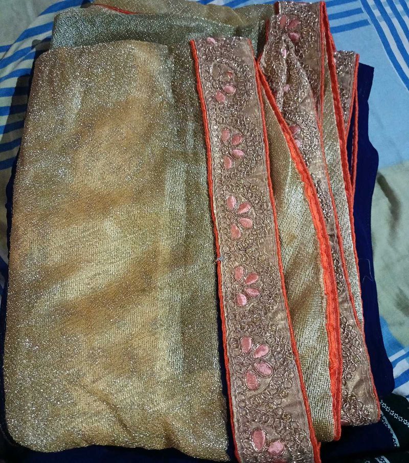 Sparkling Gold Saree with Pink Embroidery