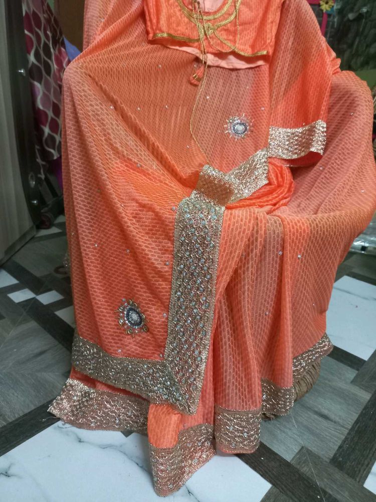 Elegant Peach Saree with Embellishments