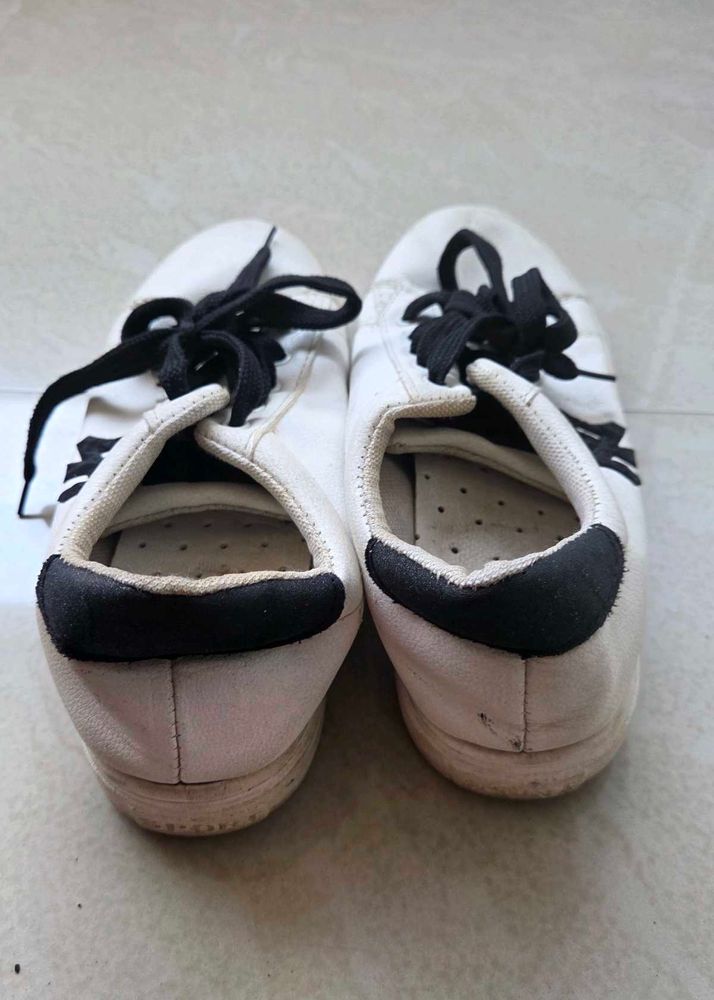 Classic White Sneakers with Black Accents