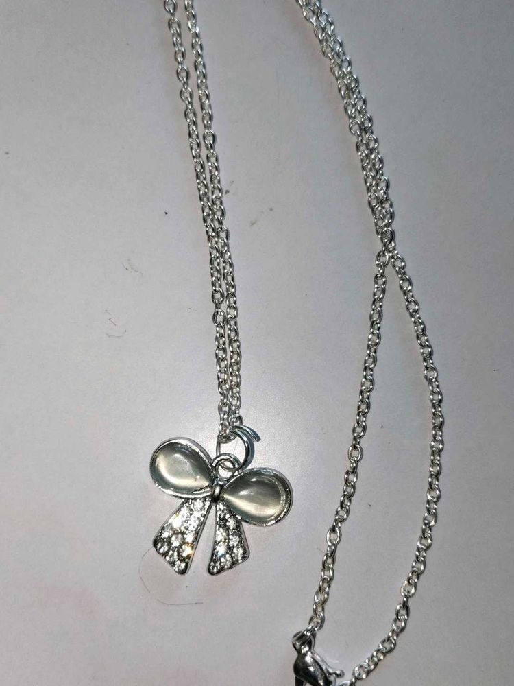 Silver Tone Bow Necklace