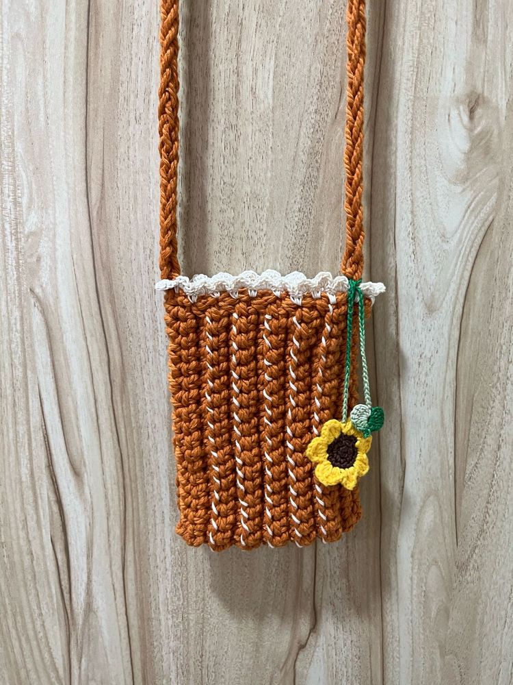 A Beautiful Crochet Handmade Mobile Sling Bag.